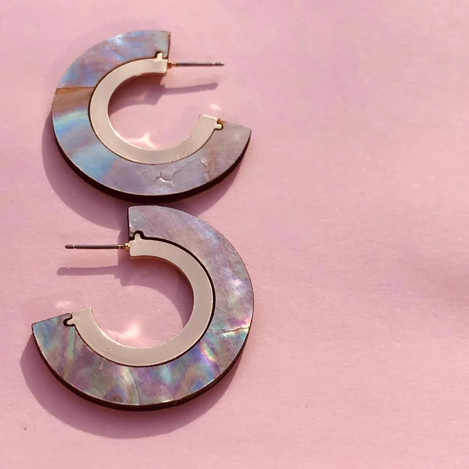 Mother of pearl sustainable stud earrings on bolster wood from Jules & Gems