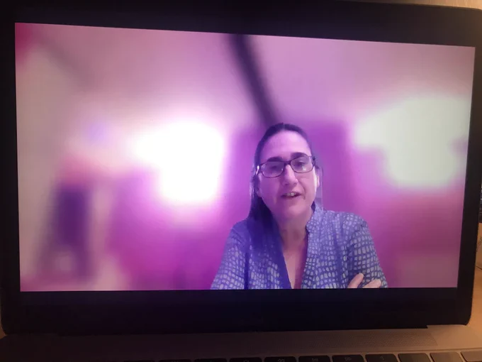 A person on a digital screen