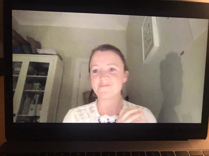 A person on a digital screen