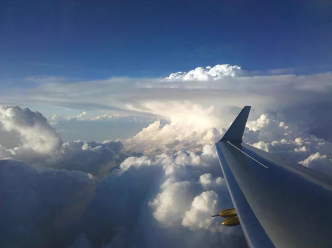 Photo of a thunder cloud taken from an airplane.