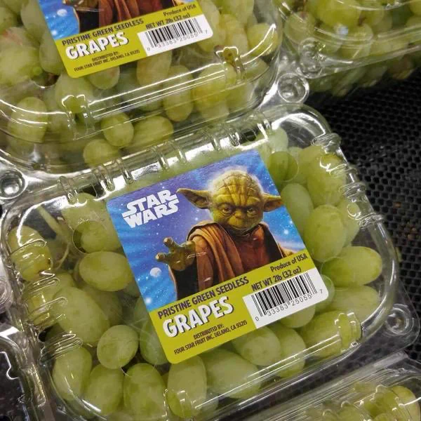 Package of grapes with a Star Wars Yoda sticker on the package.