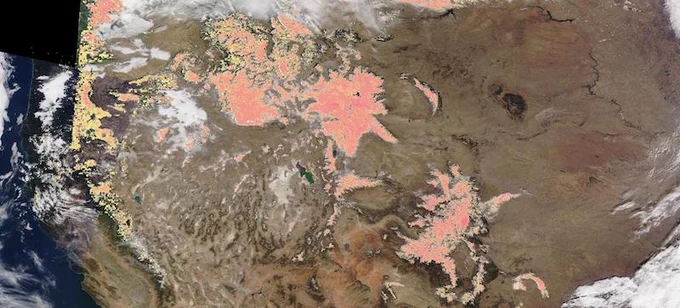 The NASA Worldview Snow Cover (Normalized Difference Snow Index (NDSI)) layer shows the presence of snow cover over land and water bodies as an index related to the presence of snow. Pink indicates moderate amounts of snow cover. 