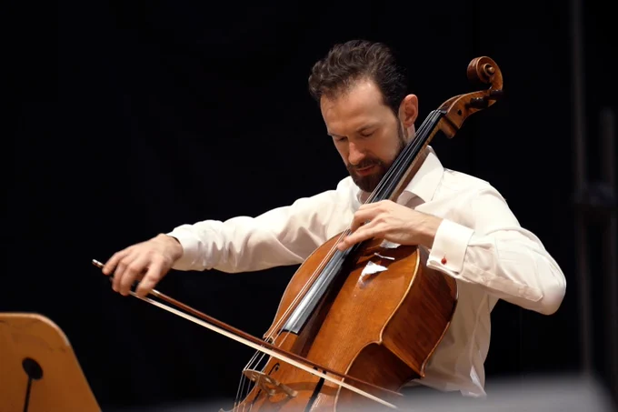 RSNO Principal Cello Aleksei Kiseliov plays the cello on the concert stage