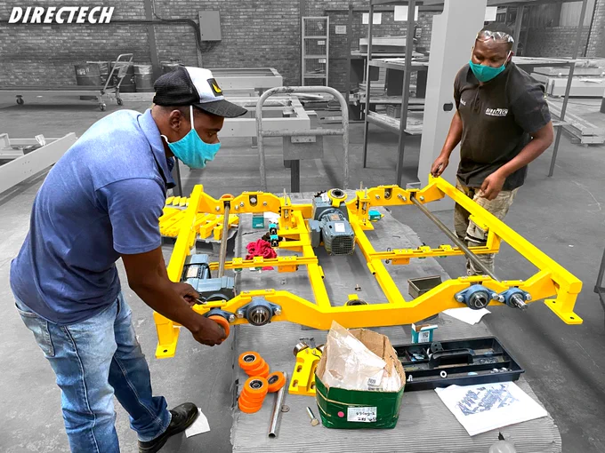 car-manufacturing-industrial-automation-robotics-skids-jigs-hoists-vw-directech-tv-trolley-body-in-white-biw