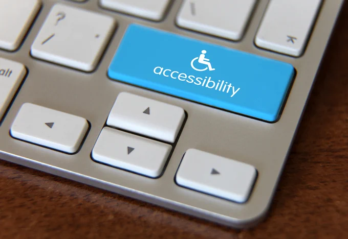 Blue key "accessibility" on a keyboard