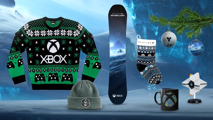 All the prizes available from the Destiny 2 Retweet to Win sweepstakes displayed. Prizes include an Xbox Christmas sweater, an Xbox coffee mug, a Destiny 2: Beyond Light snowboard, a Destiny themed stocking, and a Ghost figurine.