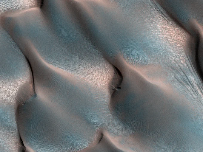 Vast sea of dunes in enhanced color on Mars. (NASA/UArizona) 