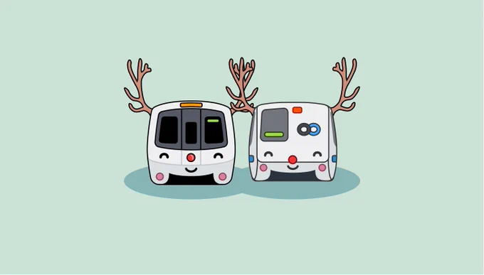 two BART trains with reindeer antlers