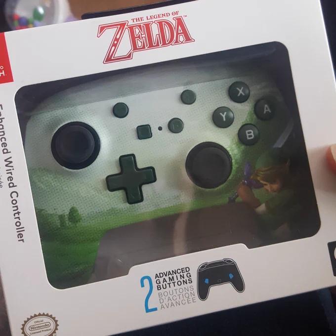Nintendk Switch wired controller with an image of Link from The Legend of Zelda game series.