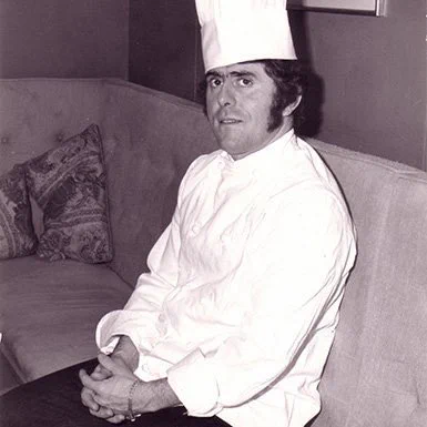 Black and white photo of dad in his chefs uniform and hat. Probably around 1967
