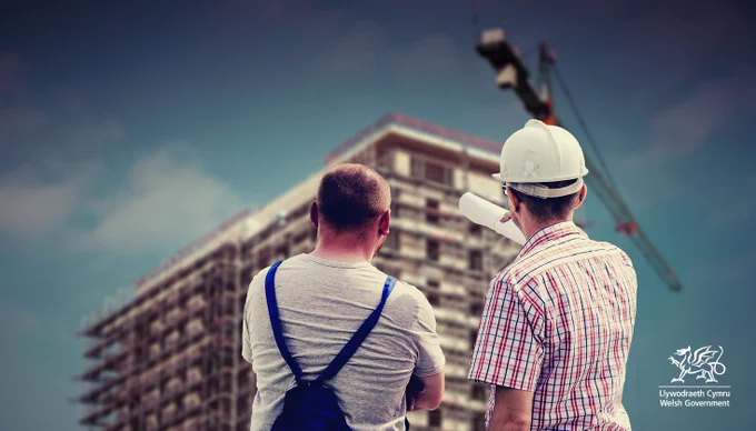 Builders working on high rise building
