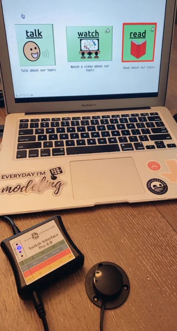 Laptop with three visuals displayed on screen with switch interface hookup.