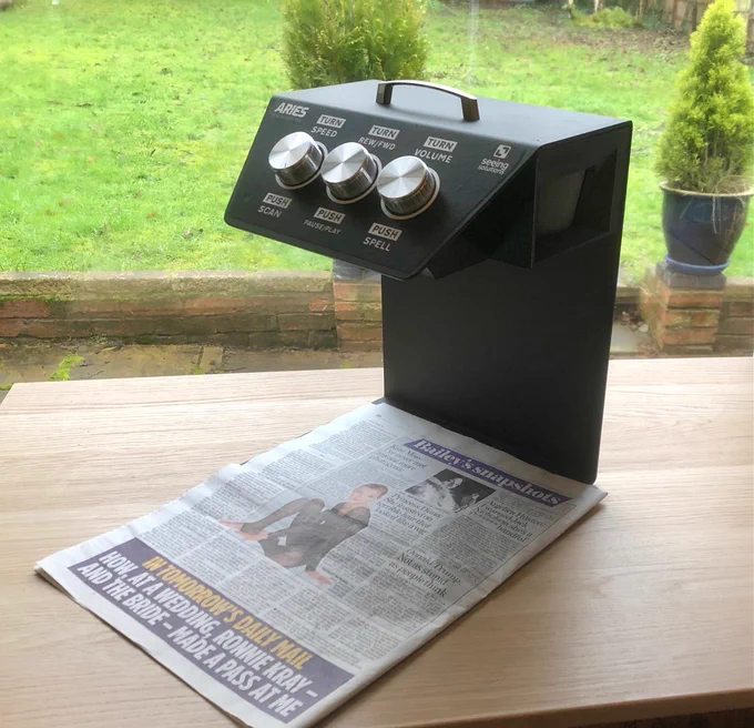 Pictures of the new Aries automatic reading machine. Just put what you want to read on the platform, it knows it is there and reads it.
