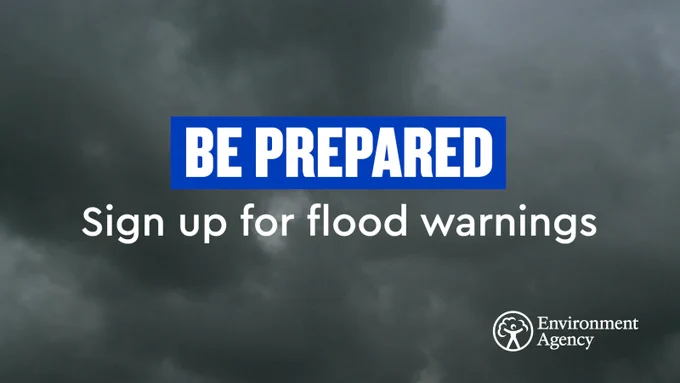 A background of stormy clouds with text overlaid, stating 'Be prepared. Sign up for flood warnings'.