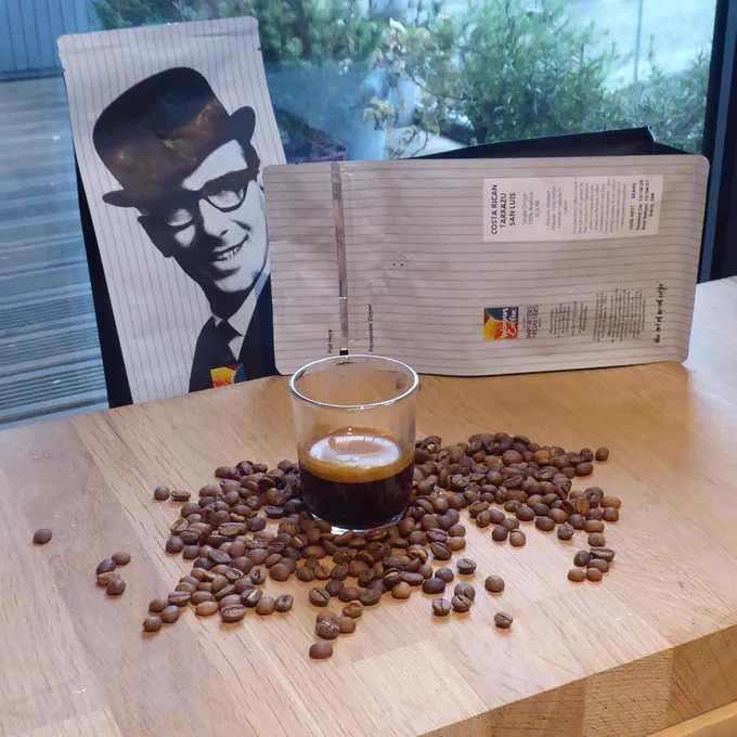 Espresso shot and specialty coffee beans roasted by Wogan Coffee. Photo by Coffee Diff.