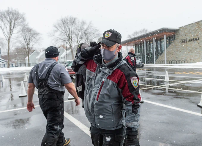 Campus Safety officers assist students moving back on to campus for spring semester. 