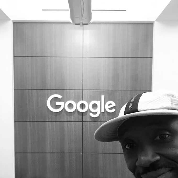 Person looking into camera, in the lobby of the google San Francisco office.