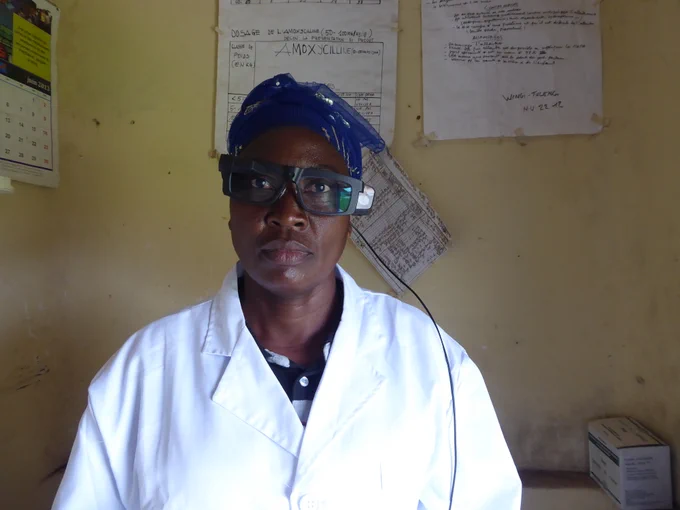 Nurse at Kigandu health center DR Congo wearing smart glasses during teleconsultations