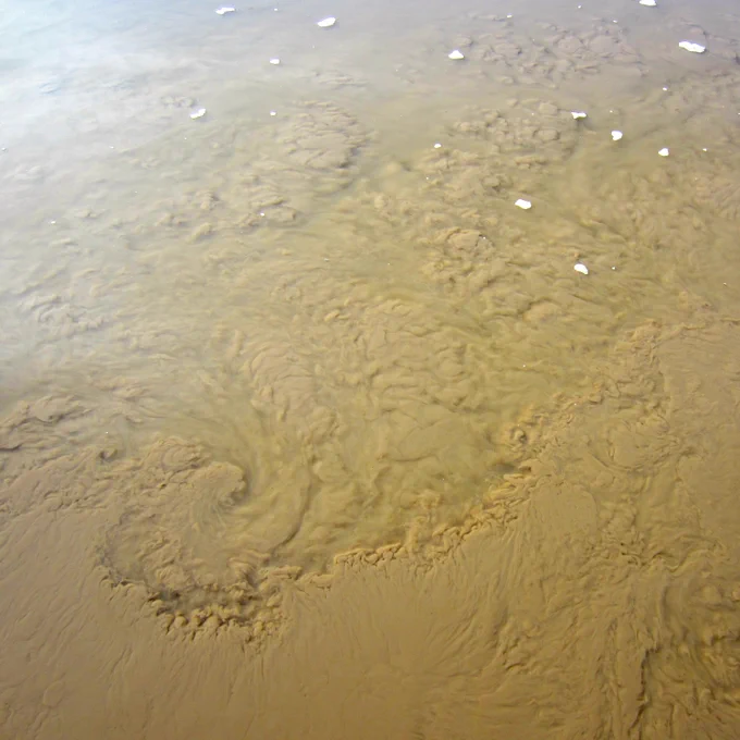 Sediment swirling in a river