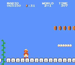 Mario on an expansive cloud, with coins.