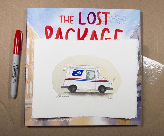 Photograph of picture book titled The Lost Package on a cardboard backdrop. A small watercolor painting of a USPS mail truck sits on top. A red permanent marker is positioned to the left.
