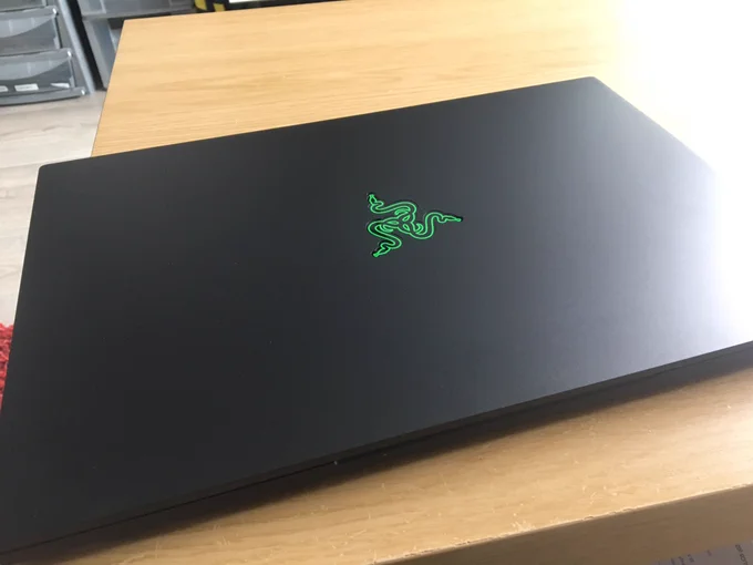 Closed Razer Blade laptop, black with the green Razer logo visible
