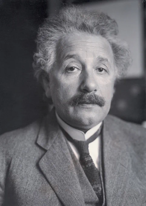 Einstein portrait with direct eye contact with camera, black and white