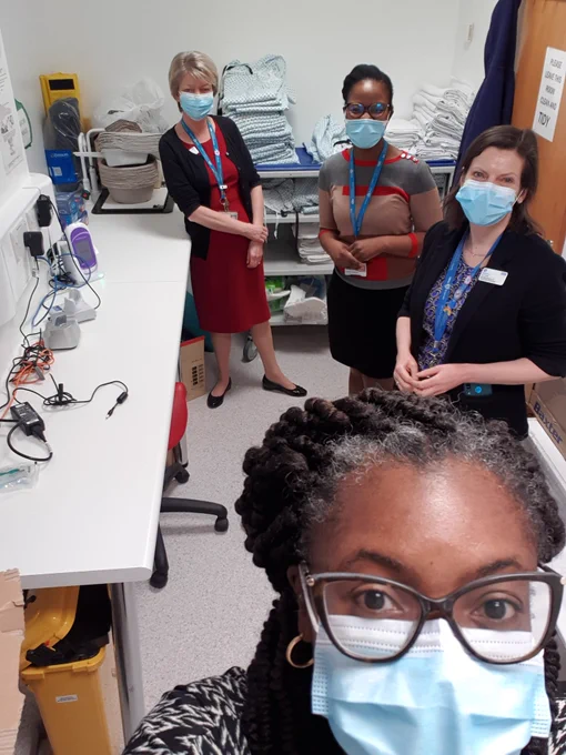Lead Healthcare Scientists with Charlene, the POCT coordinator, viewing the POCT equipment in the Emergency Department at Queen's Hospital.