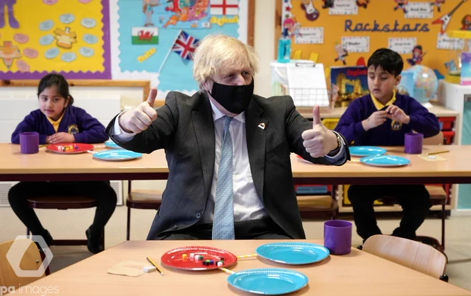 Prime Minister Boris Johnson gives a thumbs up as he joins a Year 2 maths lesson during a visit to St Mary's CE Primary School in Stoke-on-Trent, Staffordshire, to see how they are preparing for students to return. 