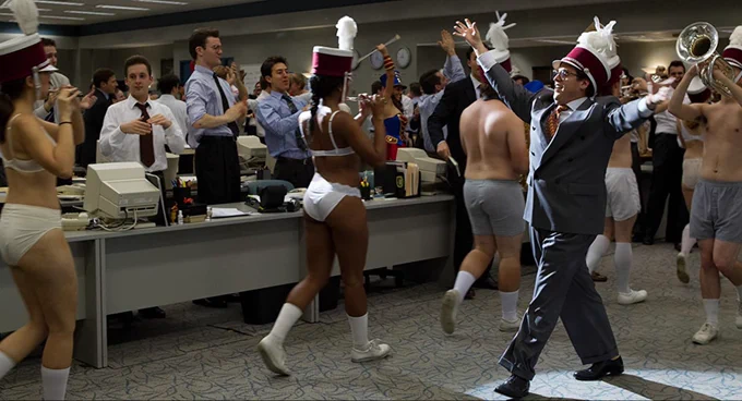 Wolf of Wall St Movie where there’s a celebration in the Stratton board room.
