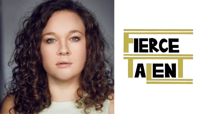 The image is of a woman, looking directly into the camera. She has curly brown hair and is wearing a white top. To the right of her is a gold and black logo reading "Fierce Talent"