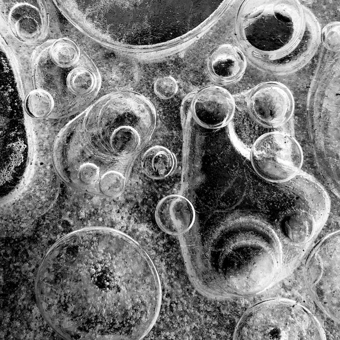 The cover art for Mute City's EP "Post-Glacial," some ice bubbles