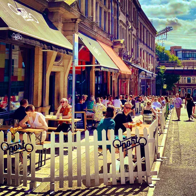 Outdoor socially distanced seating on call lane outside Oporto, knave’s kitchen and neon cactus 🌵