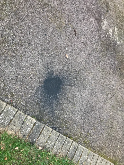 Fine grained powdered debris on a driveway from the meteorite impact.