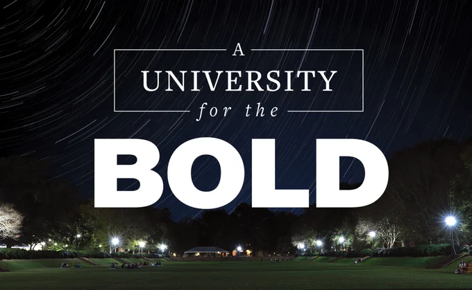 Text "A university for the bold" lies over a picture of the Sunken Garden at night.