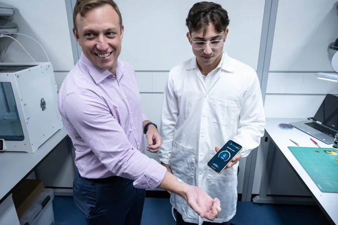 Deputy Premier of Queensland testing our Microwearable™ sensor prototype.