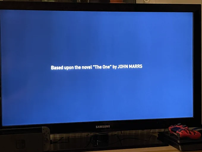 A Tv screen that says “Based upon the novel by John Marrs”