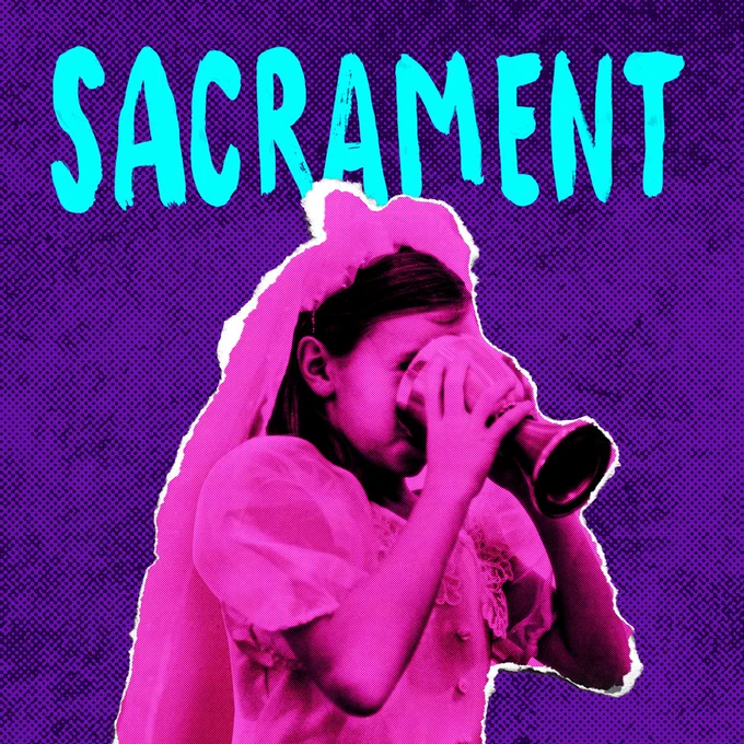 Sacrament is written across the photo. In the middle of the photo, a young girl in white christening dress drinking from a cup. 