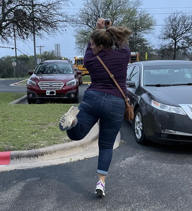 My wife doing a heel kick in the parking lot of our kid’s elementary school.