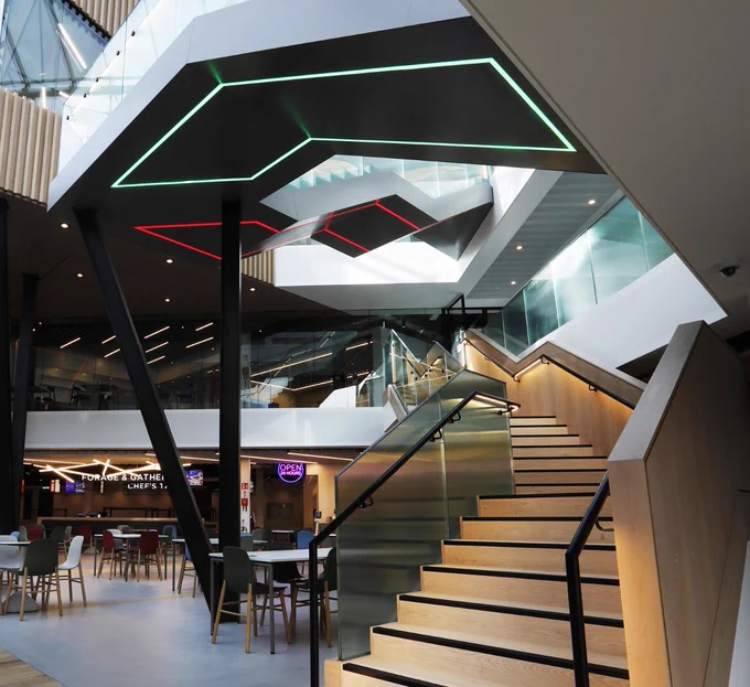 Photo of an interior stairway at the Microsoft Dublin campus, with geometric LED lights above.