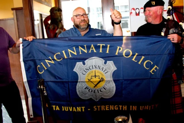 Sgt. Sal Tufano recieving the CPD Flag