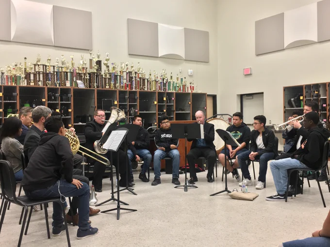 The ROCO Brass Quintet visiting Sharpstown High School last season for a performance and masterclass