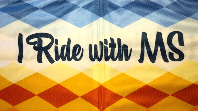 Cycling jersey with words "I Ride with MS" 