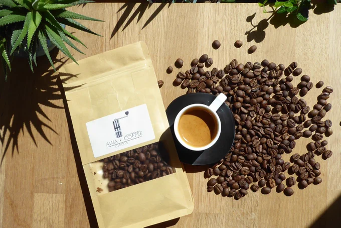 Espresso shot, surrounded by coffee beans from Ethiopia. Roasted by AWA Coffee. Photo by coffeediff.co.uk