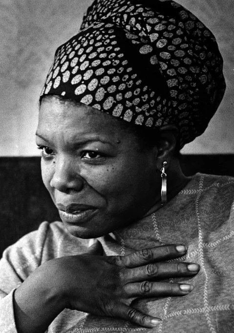 Maya Angelou wearing a headwrap in black and white.