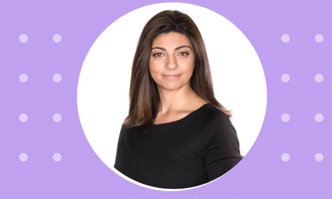 A headshot of Dr. Rana el Kaliouby, smiling at the camera.