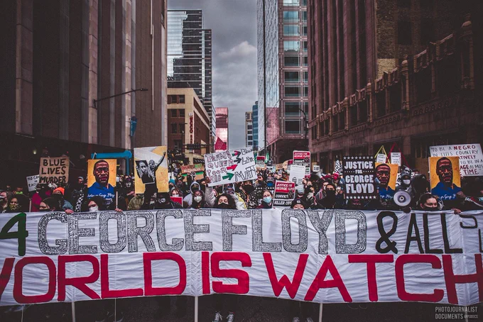 Monday, April 19th, 2021: Organized by a coalition of more than 20 activist groups around the Twin Cities, protesters march through downtown Minneapolis as the jury deliberates in the Derek Chauvin Trial demanding change in policing, justice for George Floyd, and the end of "Operation Safety Net". Signs in the crowd read things like "BLUE LIVES MURDER" and "JUSTICE FOR GEORGE FLOYD". Photo by independent frontline photojournalist @pjdocs