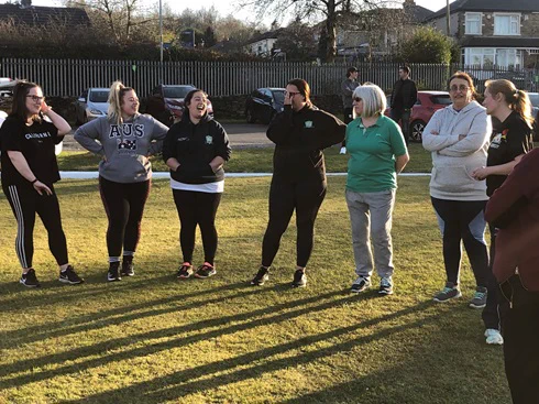 Women enjoying some cricket.