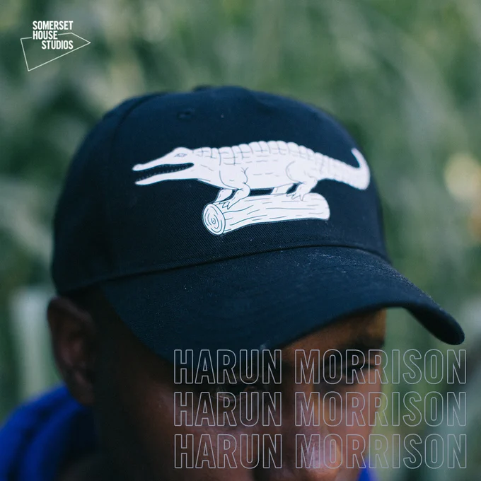 Graphic design featuring a picture of Harun Morrison in a cap with a crocodile design 