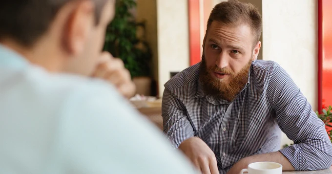 two men talking